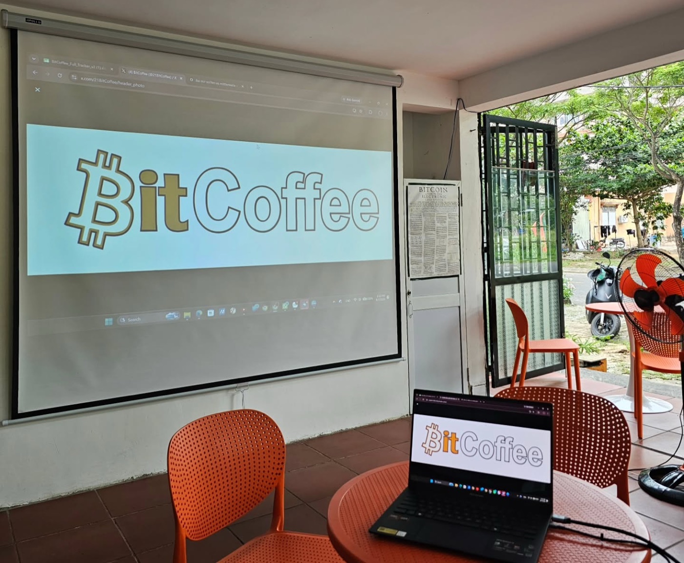Inside BitCoffee - the framed Bitcoin whitepaper and projector screen