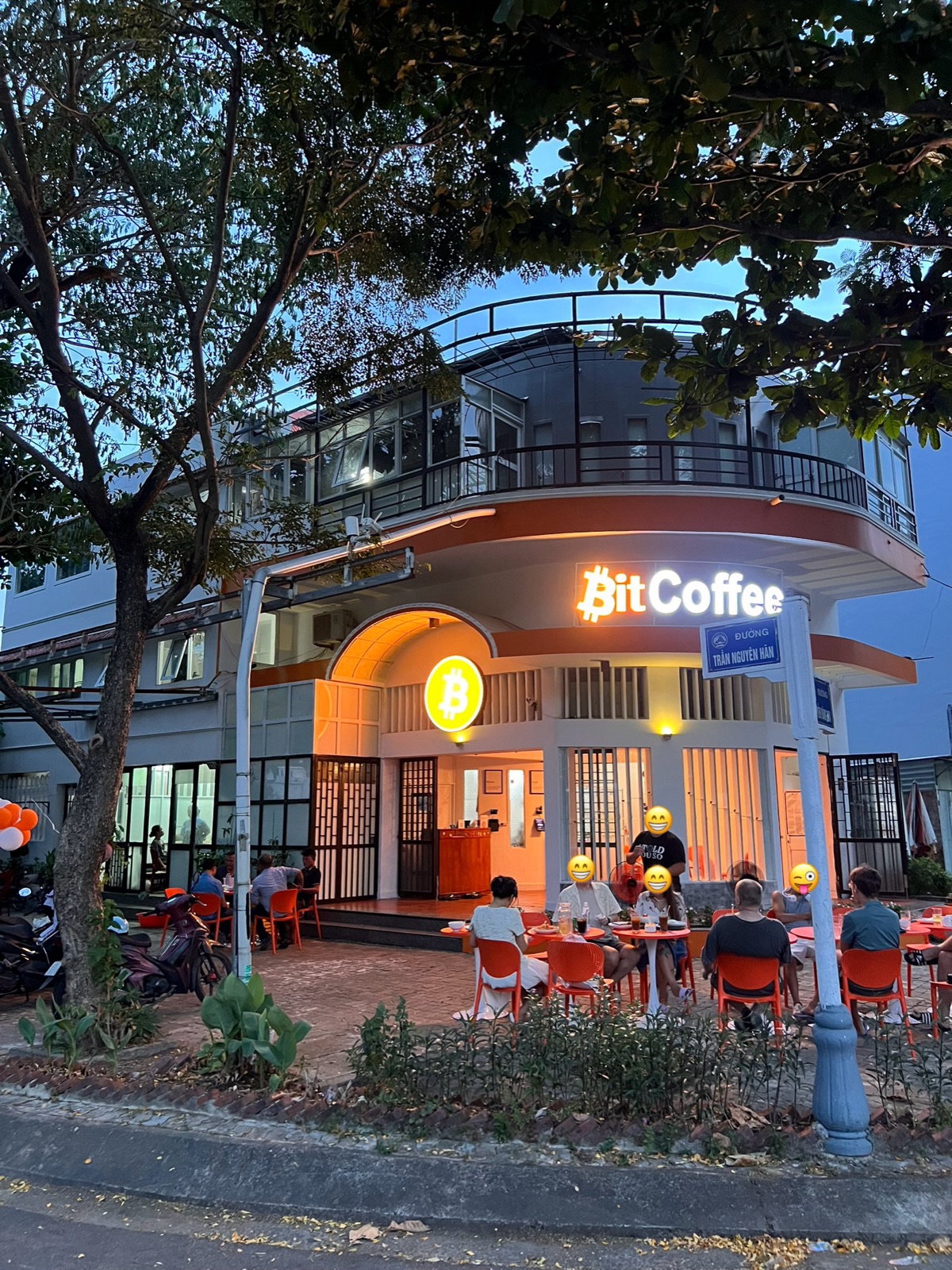 BitCoffee at dusk, Son Tra, Da Nang - lit channel letters and the glowing orange Bitcoin roundel